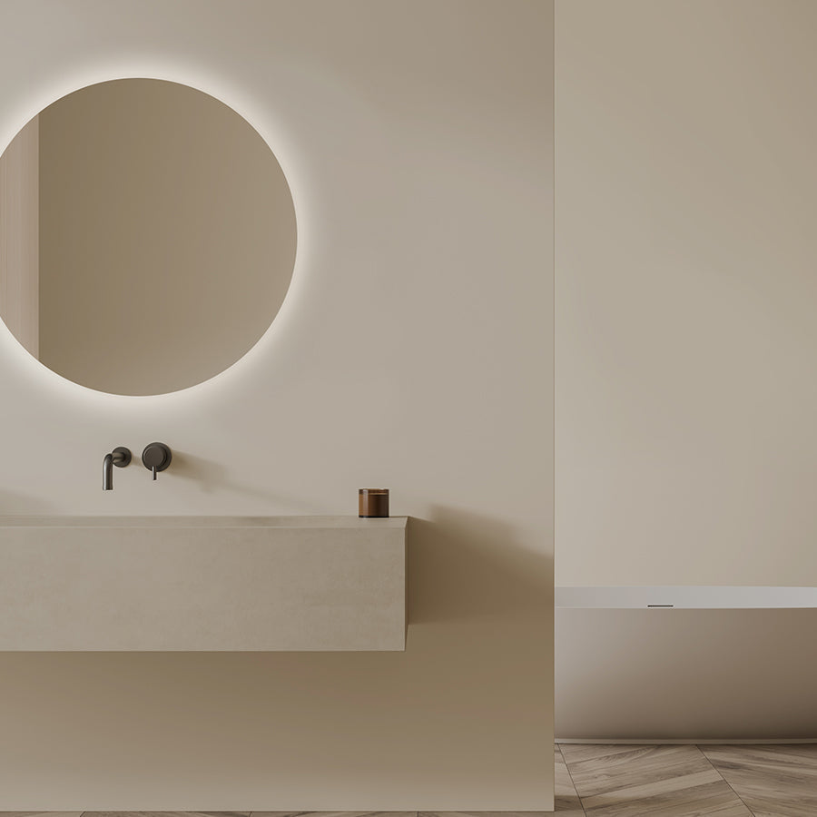 Badspiegel Brio Clear S IP44 rund mit warmem Lichtring an der Wand