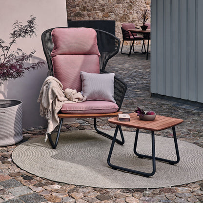 Weishäupl Outdoor-Teppich rund Sand mit Relax-Sessel auf der Terrasse